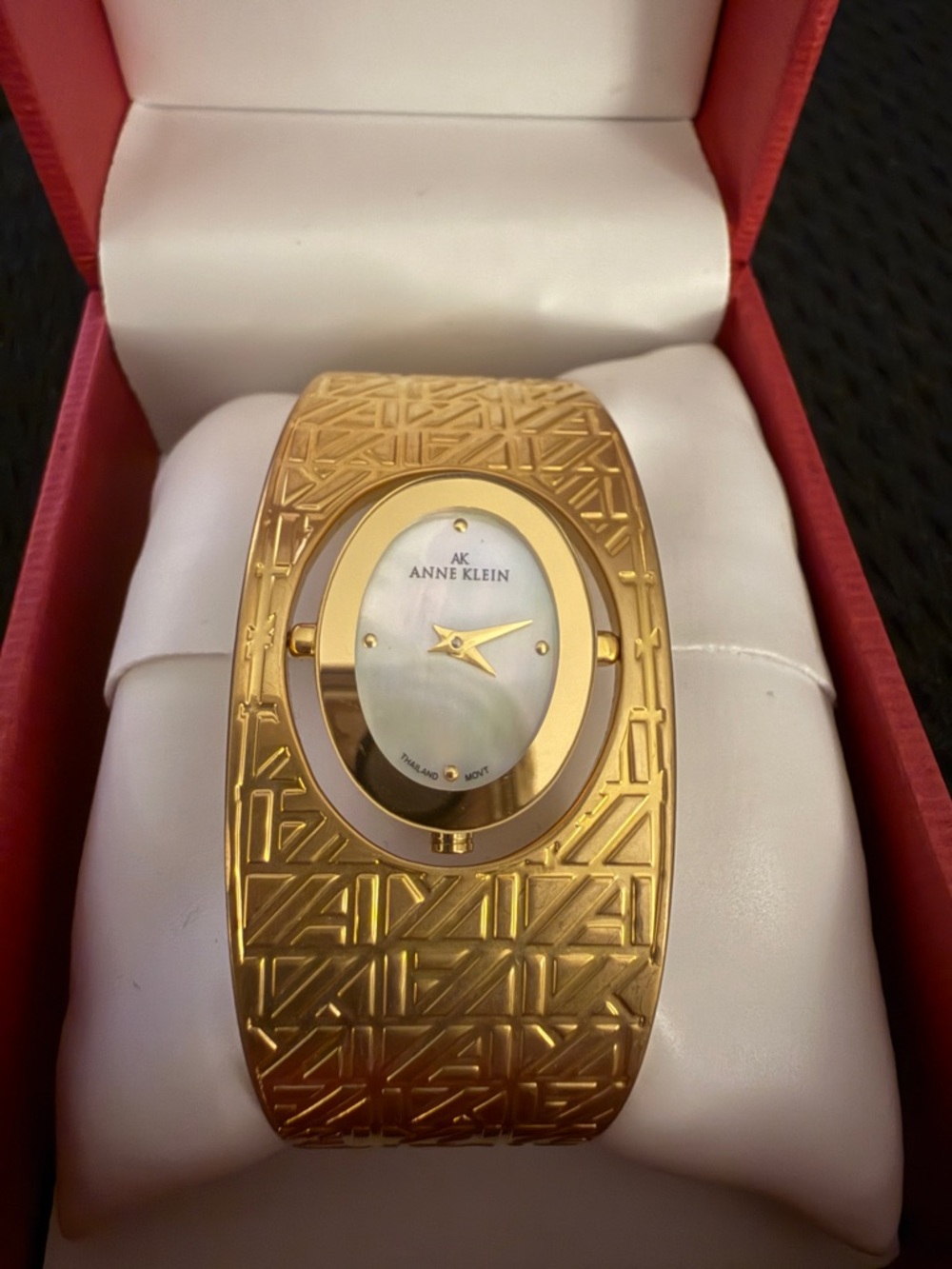 Anne Klein Gold-Tone Textured Bangle Watch with Mother-of-Pearl Dial